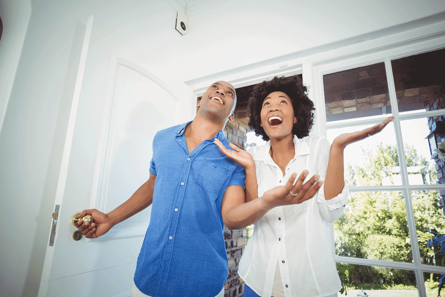 couple entering new home