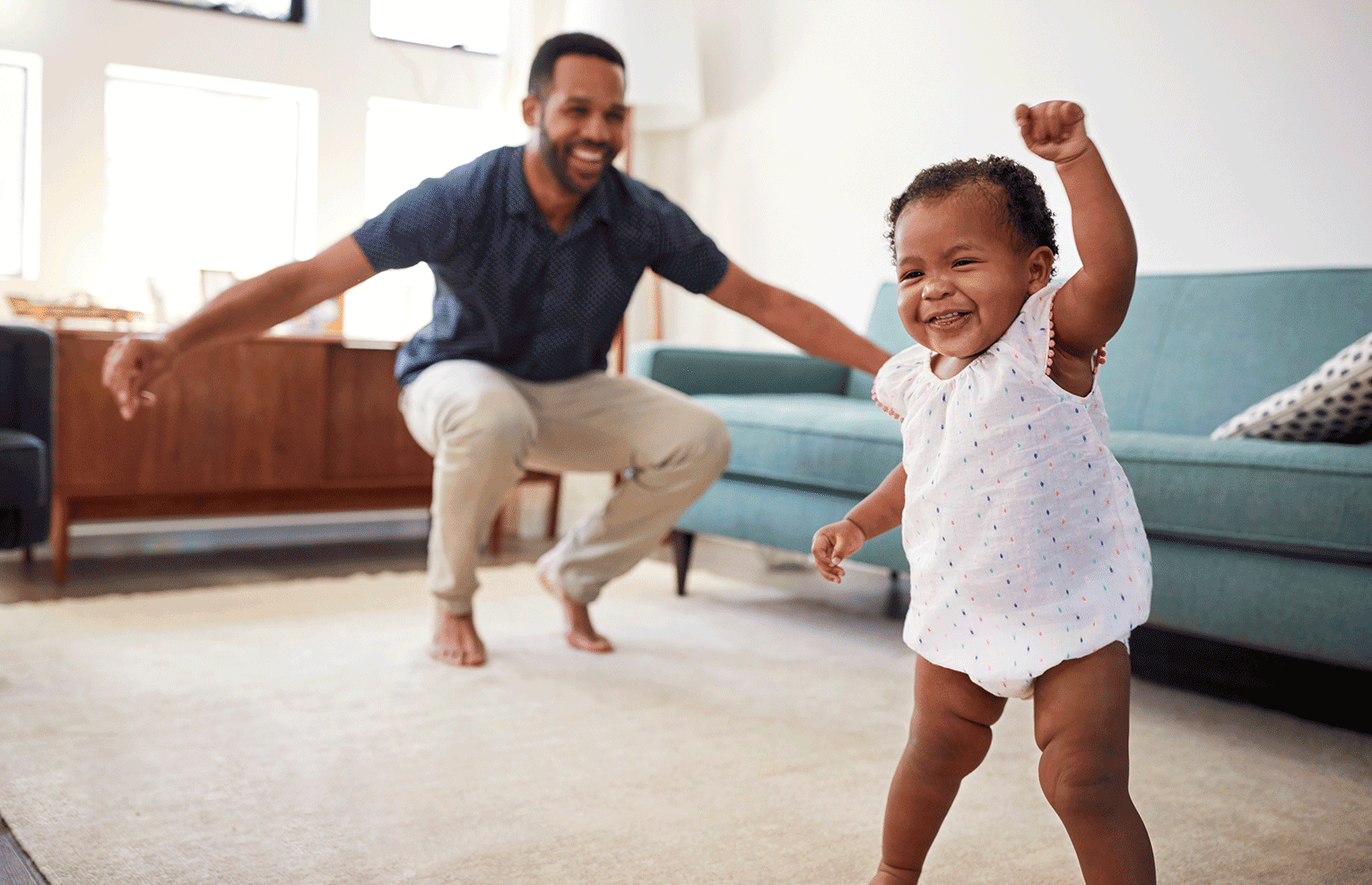 Father with child learning to walk