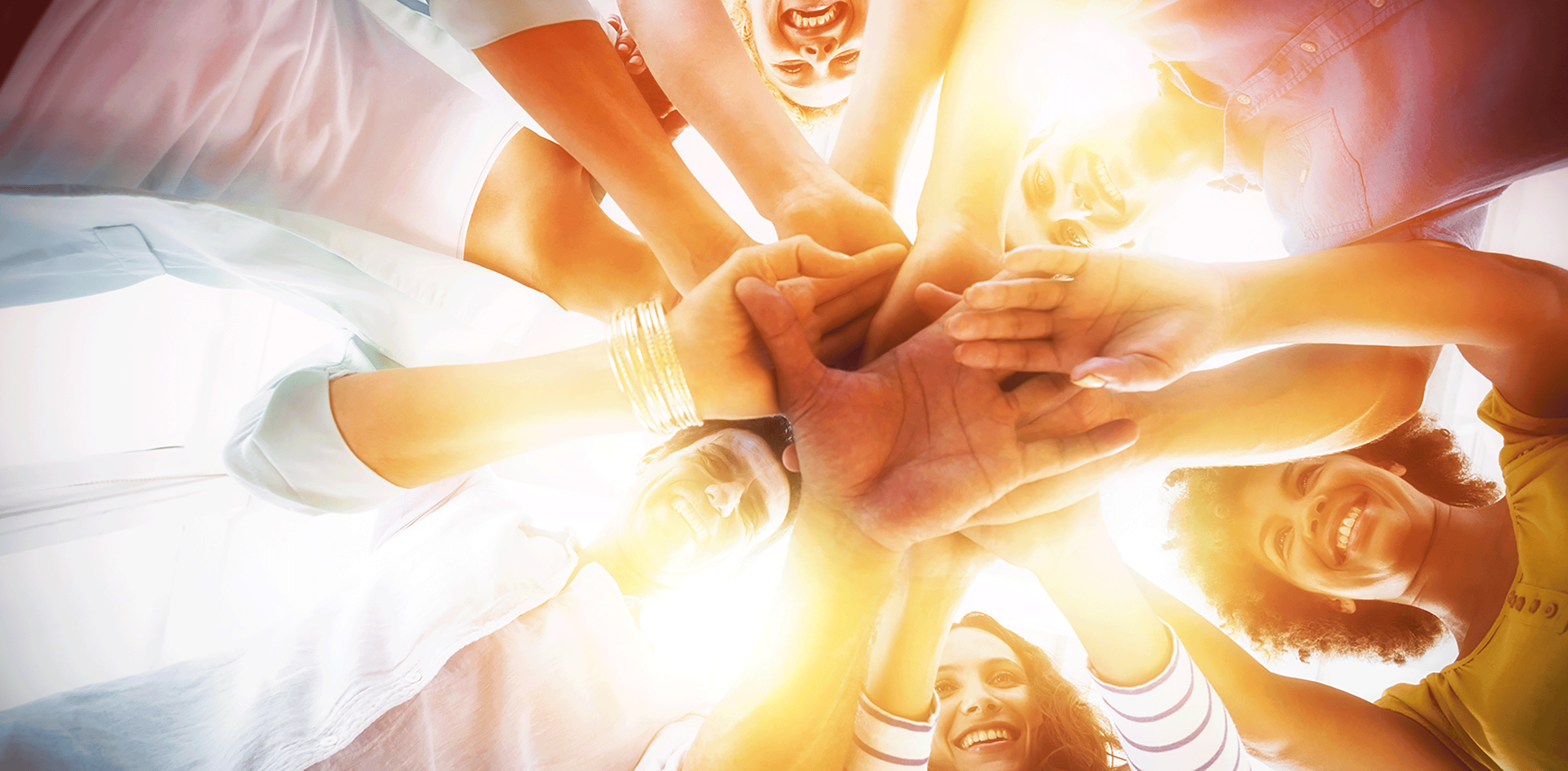 Team putting their hands together
